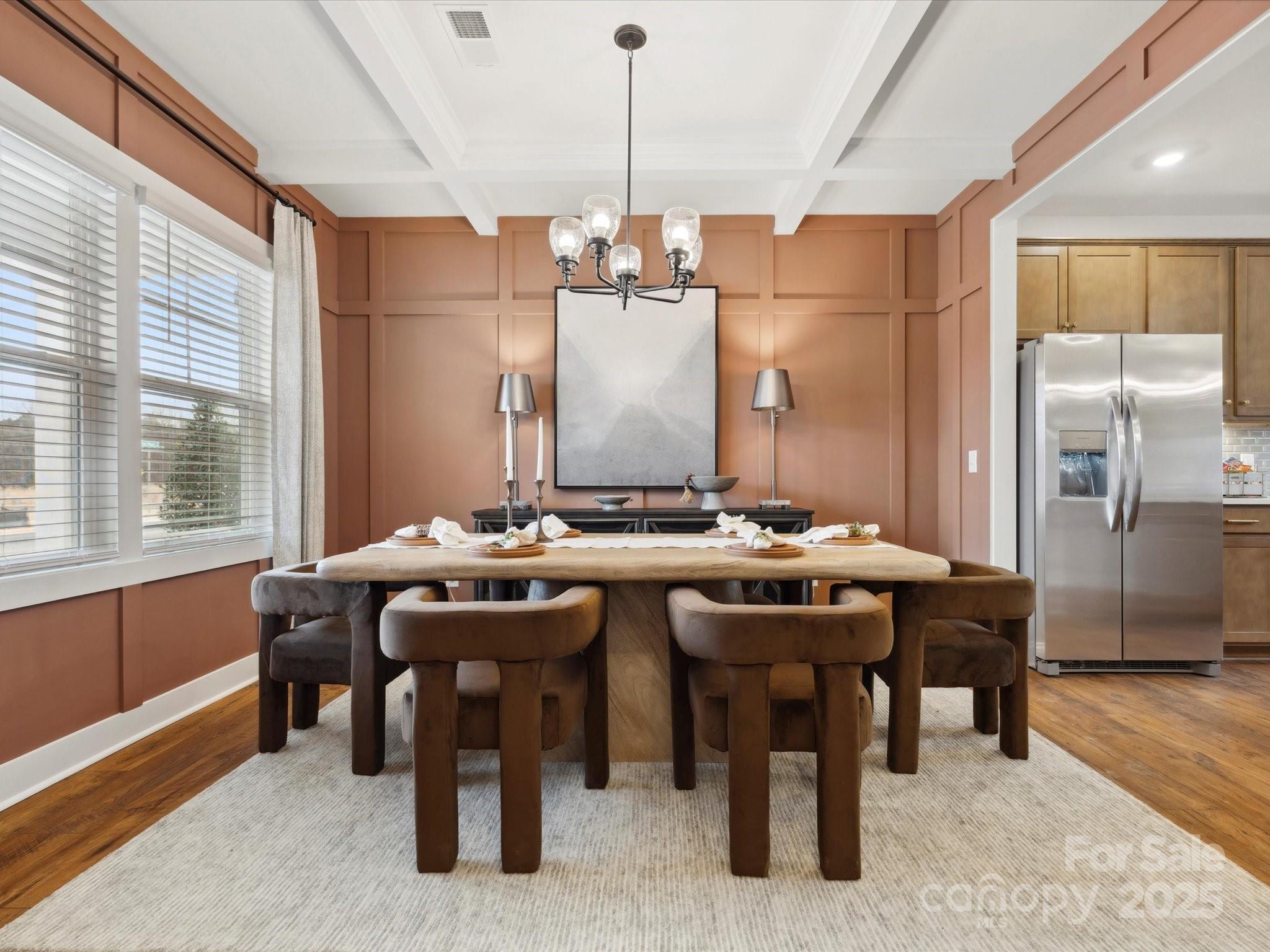 1018 Puddle Pond Road Indian Trail, NC 28079 - Photo 15 of 34 a kitchen with a sink and chairs