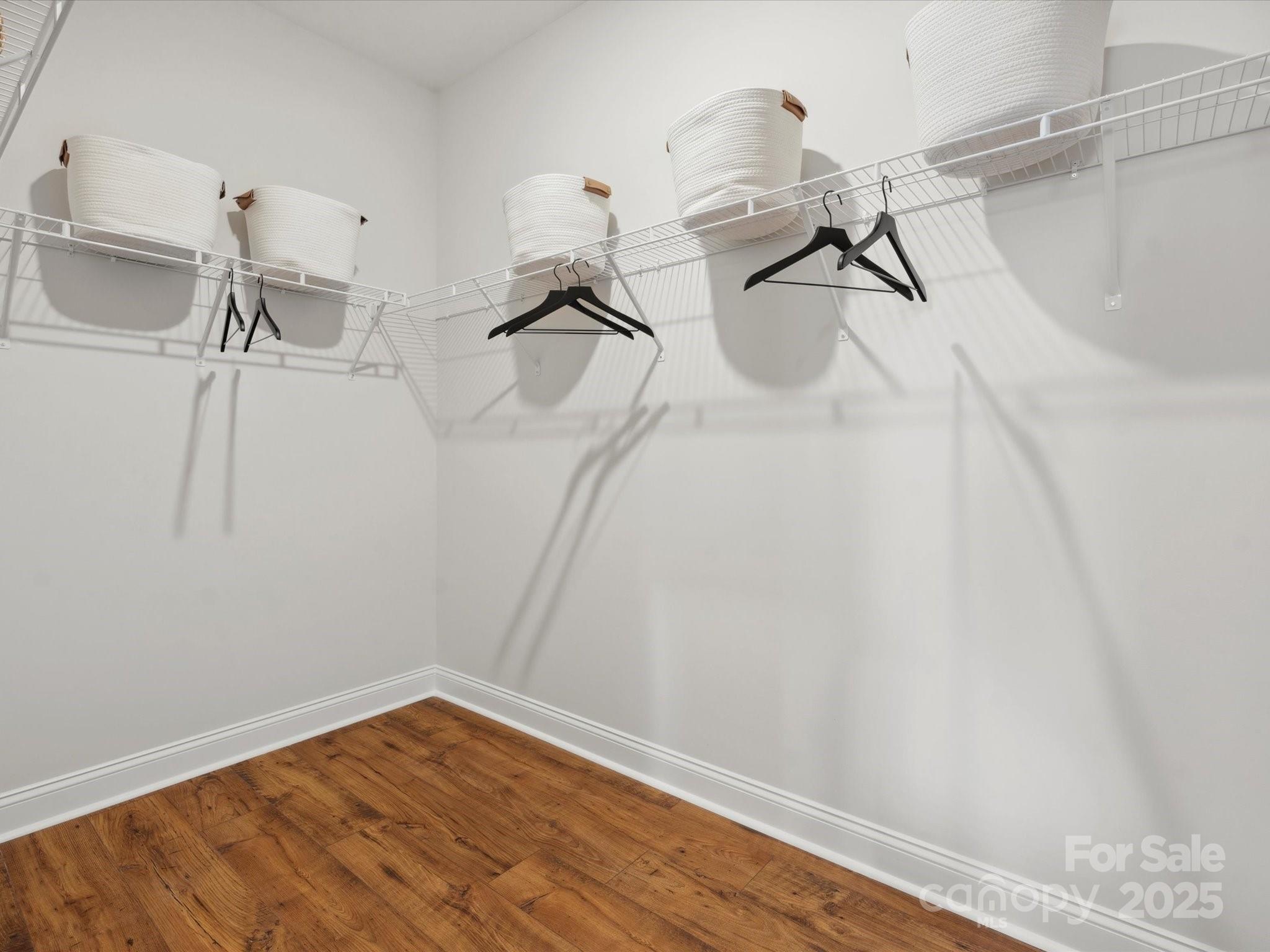 1018 Puddle Pond Road Indian Trail, NC 28079 - Photo 18 of 34 a view of a room with racks on the wall