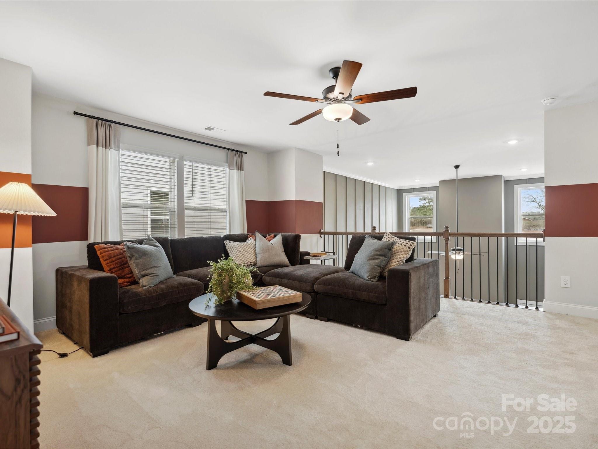 1018 Puddle Pond Road Indian Trail, NC 28079 - Photo 27 of 34 a living room with furniture and a window