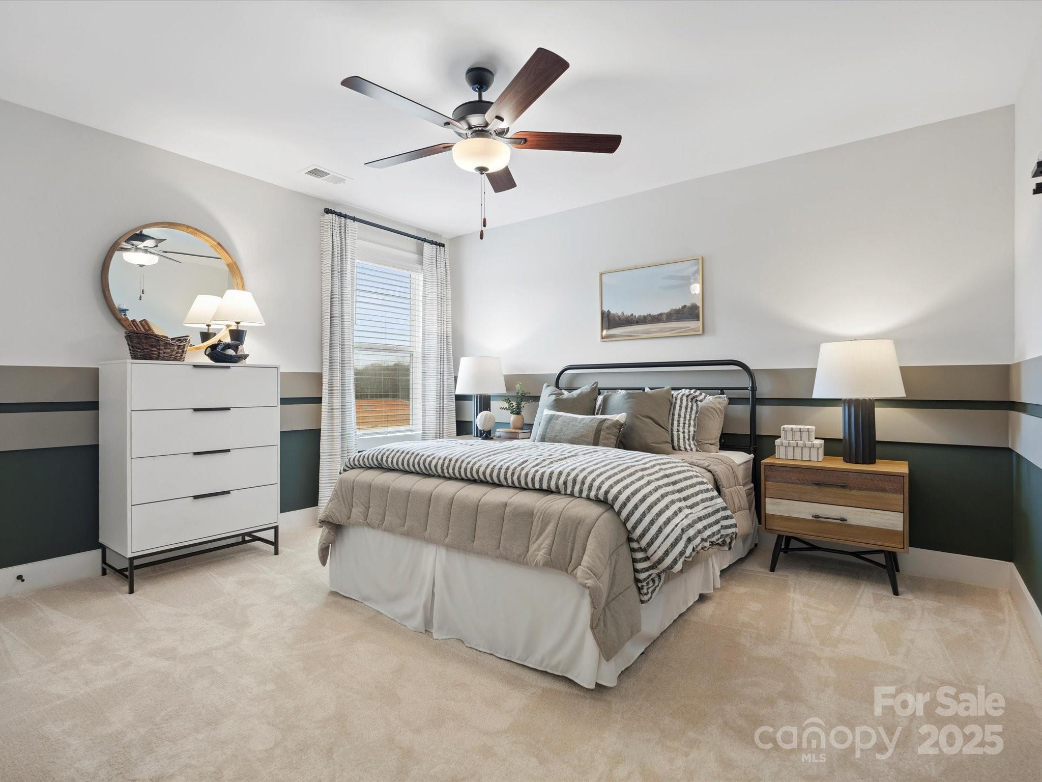 1018 Puddle Pond Road Indian Trail, NC 28079 - Photo 29 of 34 a bedroom with bed and window