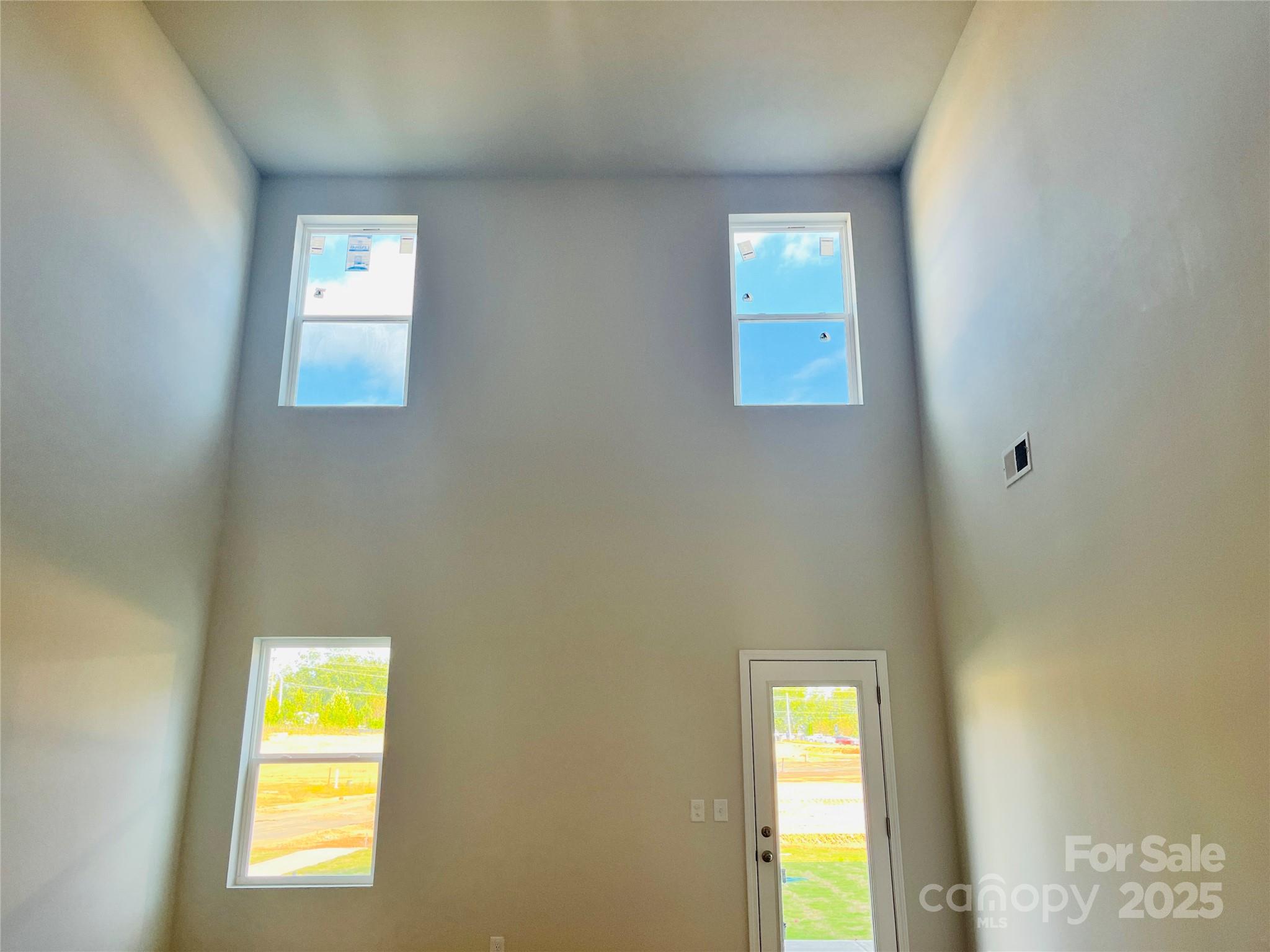 1018 Puddle Pond Road Indian Trail, NC 28079 - Photo 5 of 34 a view of a hallway with a window