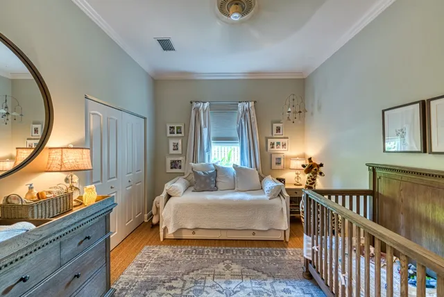 a bedroom with double bed and a window