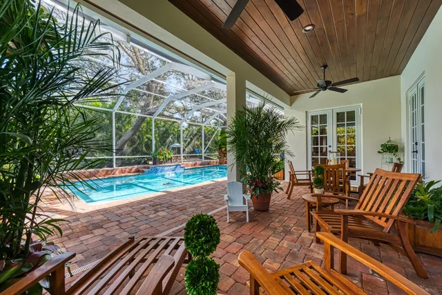 a backyard of a house with outdoor seating