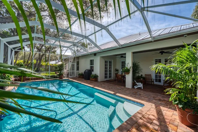 a view of a house with patio outdoor seating area