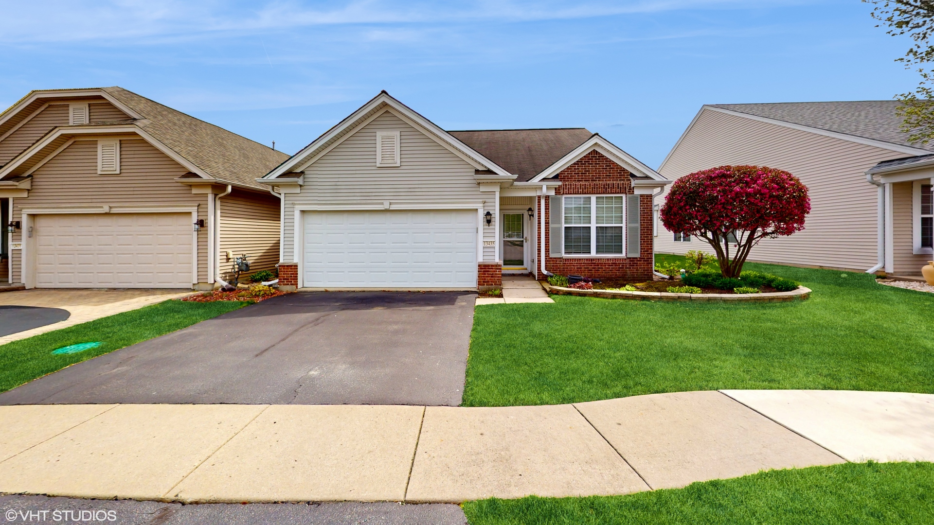13435 Nealy Road Huntley, IL 60142 - Photo 1 of 30 a front view of house with yard and green space