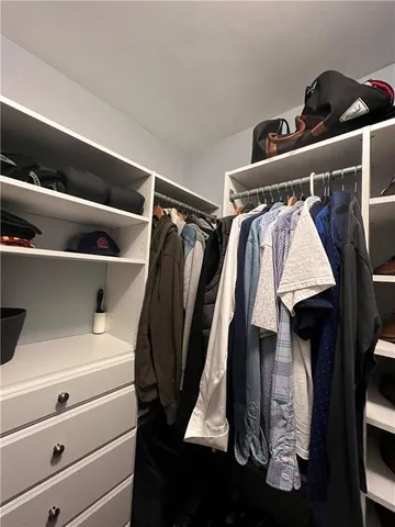 a close up view of walk in closet
