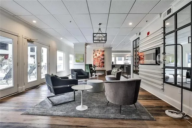 a view of a workspace with furniture