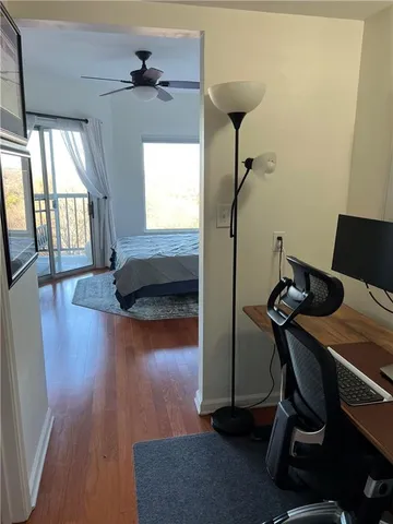 a living room with fireplace furniture and a chandelier
