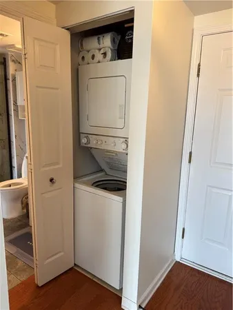 a bathroom with a shower and toilet
