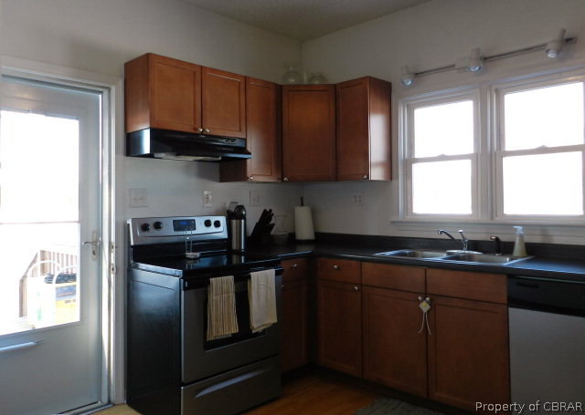 1611 Windsor Road Dutton, VA 23050 - Photo 16 of 30 a kitchen with a sink stove top oven and refrigerator
