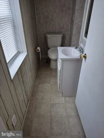 a bathroom with a sink and toilet