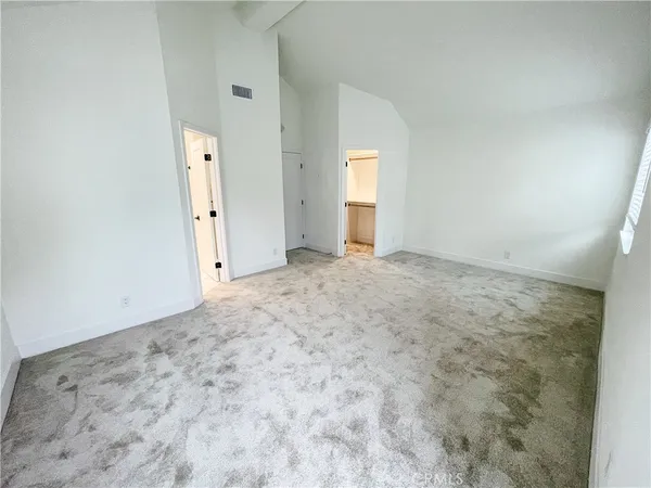 an empty room with a natural light