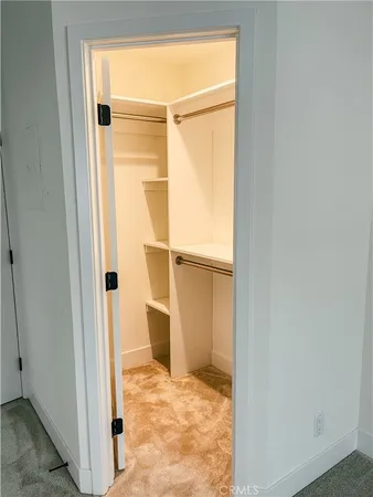 a view of a room with a door