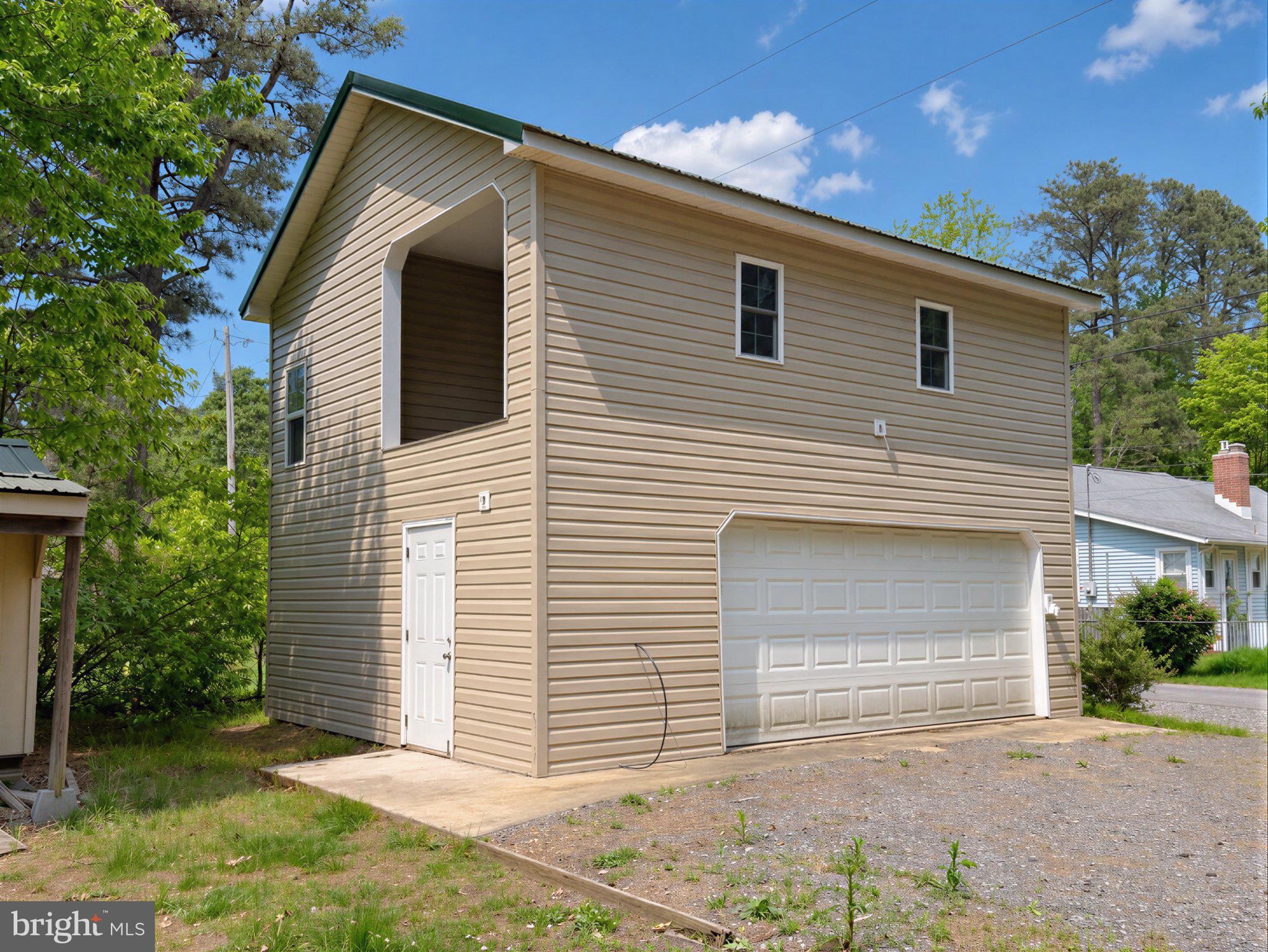 42195 White Point Beach Road Leonardtown, MD 20650 - Photo 13 of 57 Charming two-story home with garage.
