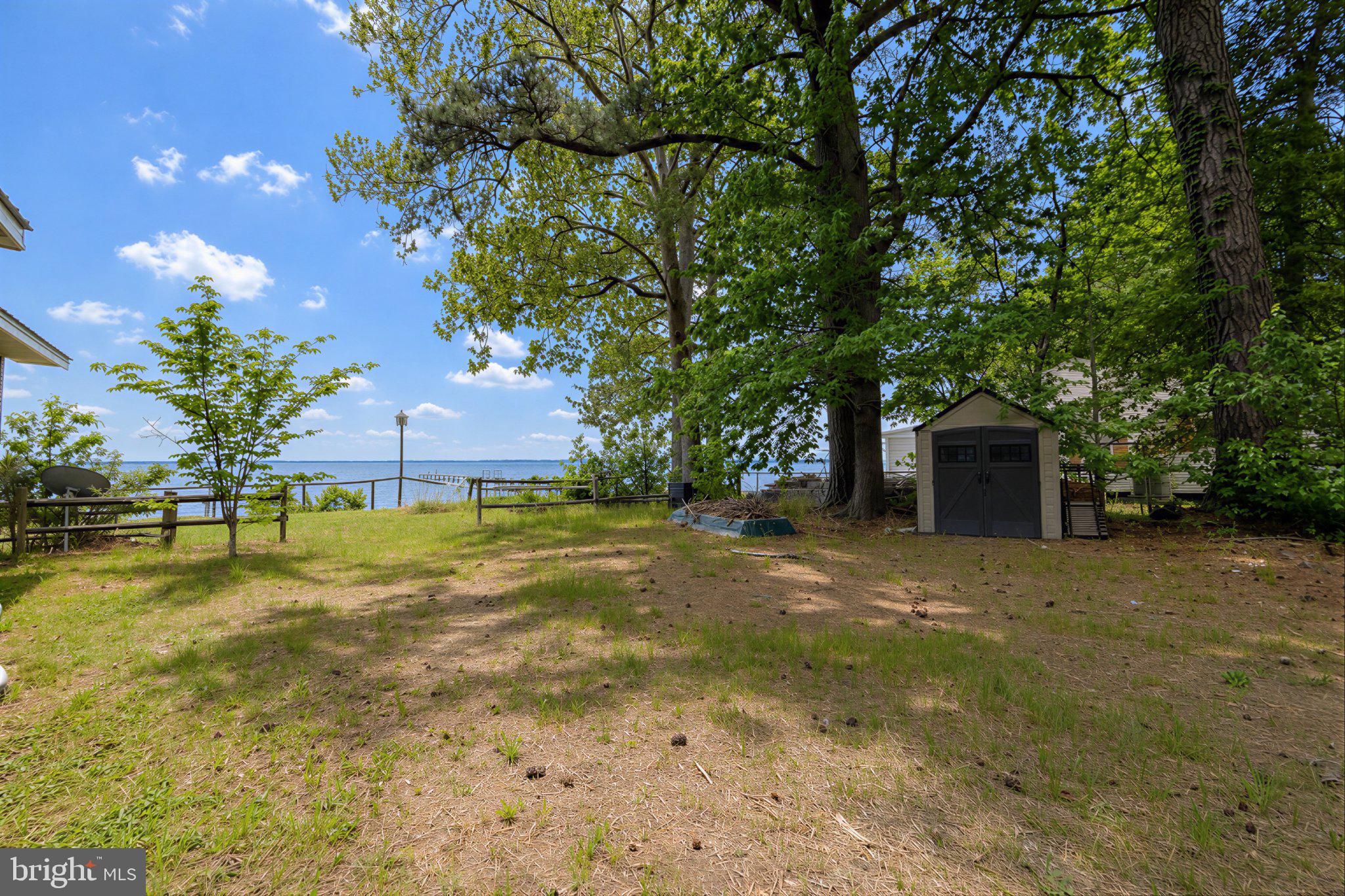 42195 White Point Beach Road Leonardtown, MD 20650 - Photo 15 of 57 Lush lakeside retreat with serene views.