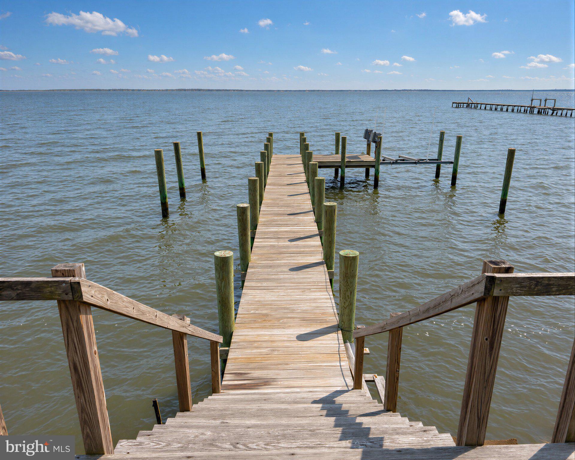 42195 White Point Beach Road Leonardtown, MD 20650 - Photo 24 of 57 Tranquil dock by serene waters.