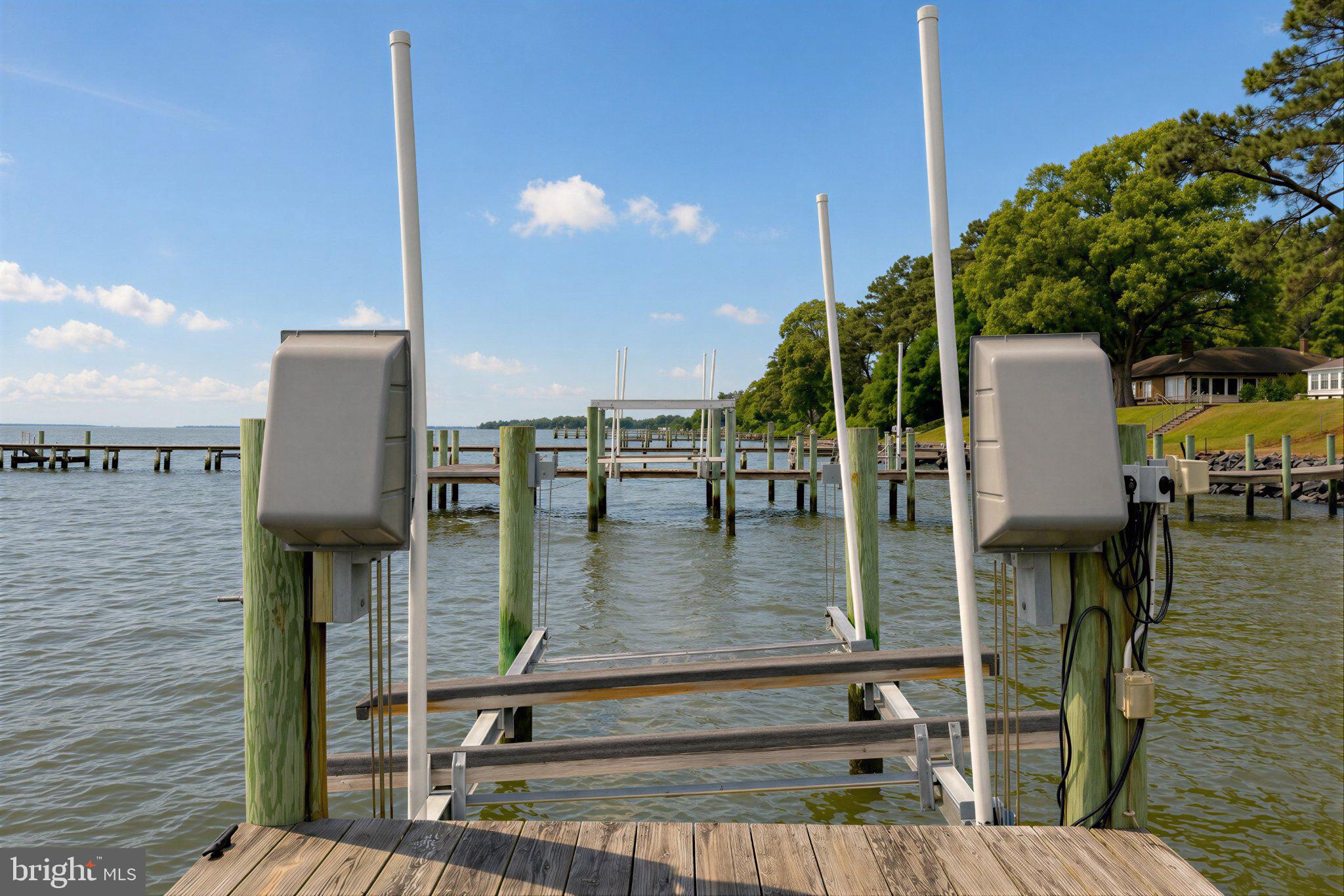 42195 White Point Beach Road Leonardtown, MD 20650 - Photo 27 of 57 Tranquil dock by serene waters.
