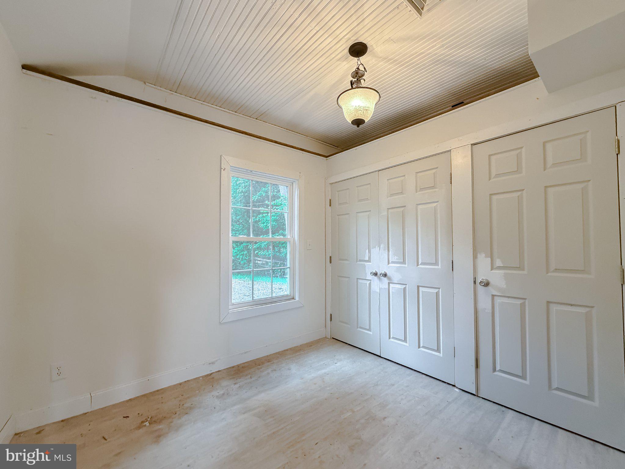 42195 White Point Beach Road Leonardtown, MD 20650 - Photo 33 of 57 Bright and airy room with dual closets.