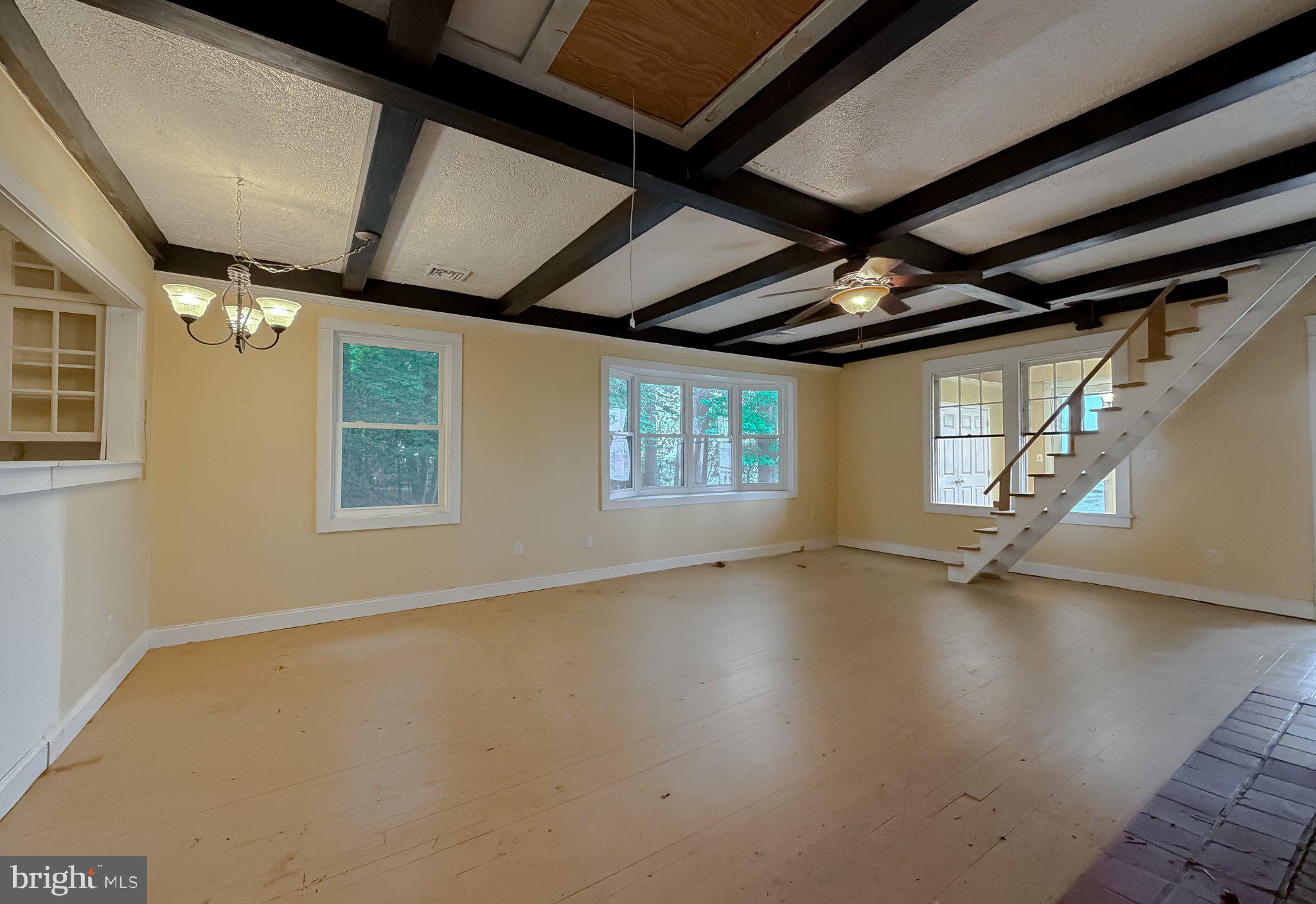 42195 White Point Beach Road Leonardtown, MD 20650 - Photo 37 of 57 Spacious room with charming beams.