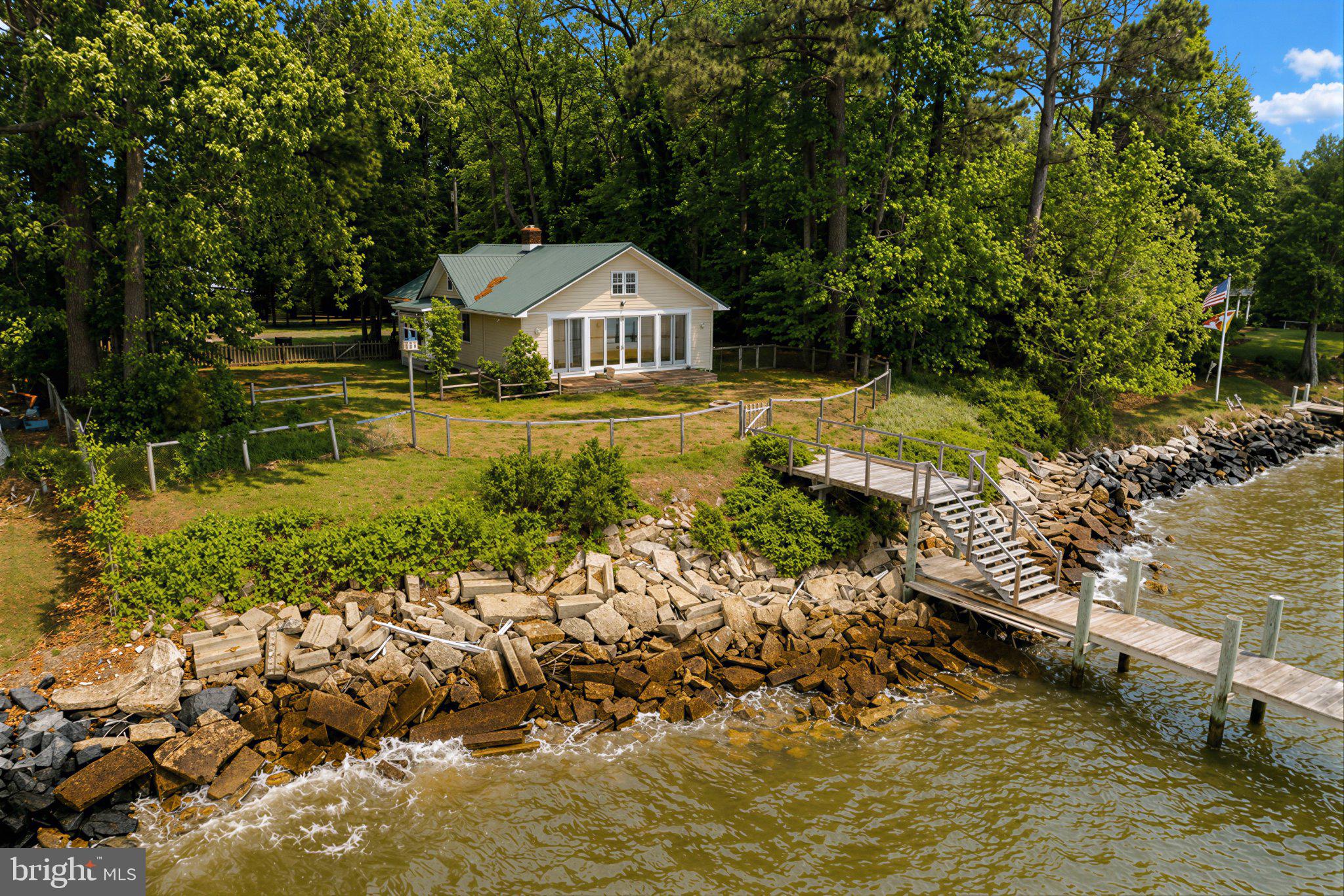 42195 White Point Beach Road Leonardtown, MD 20650 - Photo 7 of 57 Charming lakeside retreat awaits you.