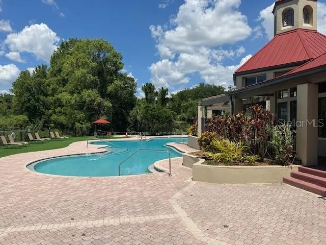 a view of a lake with a yard