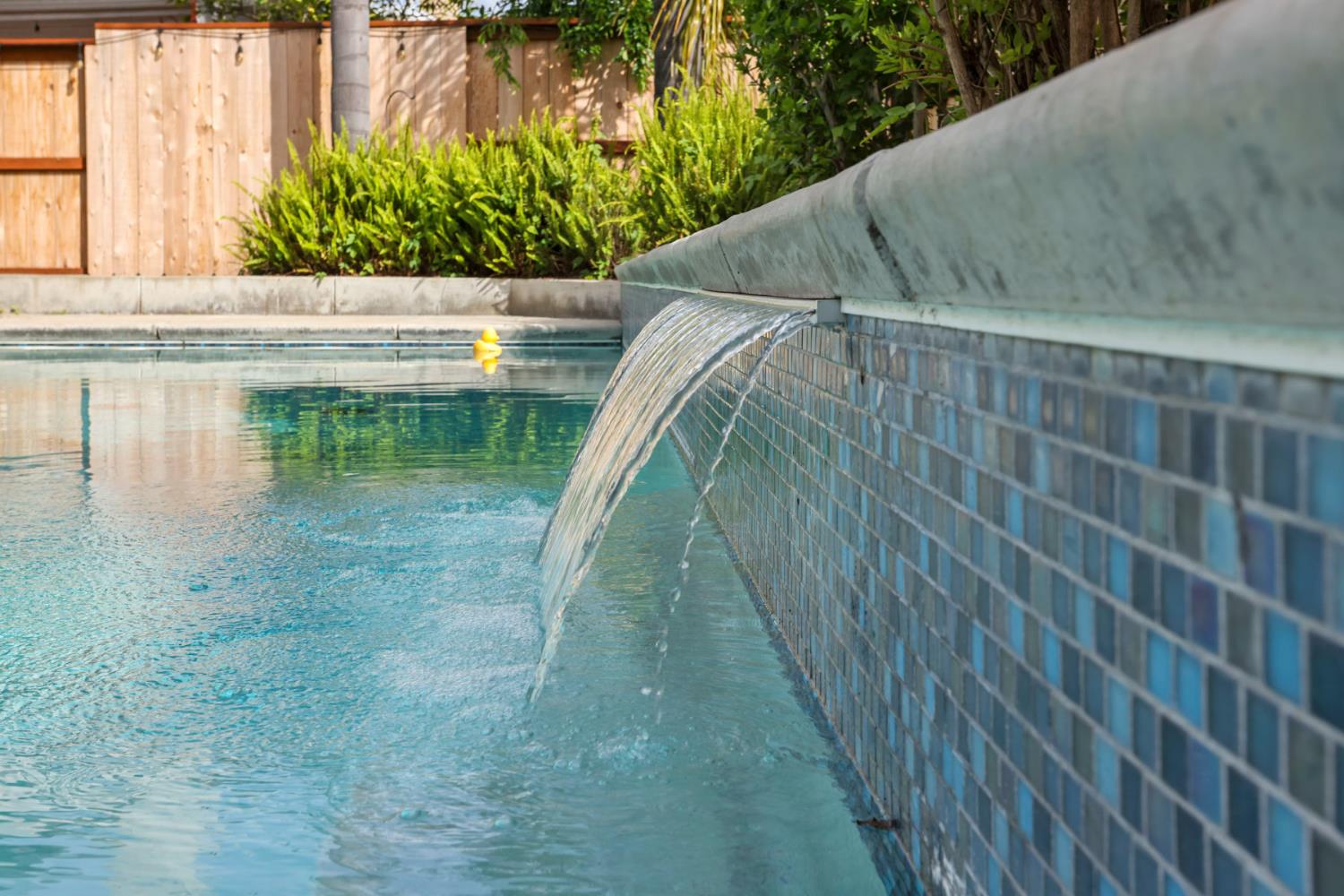 3755 Canyonlands Road Stockton, CA 95209 - Photo 32 of 37 a view of swimming pool with a yard