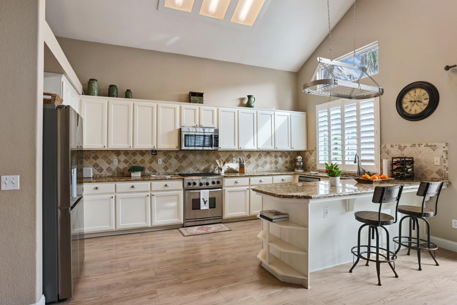 3755 Canyonlands Road Stockton, CA 95209 - Photo 7 of 37 a kitchen with a cabinets and window