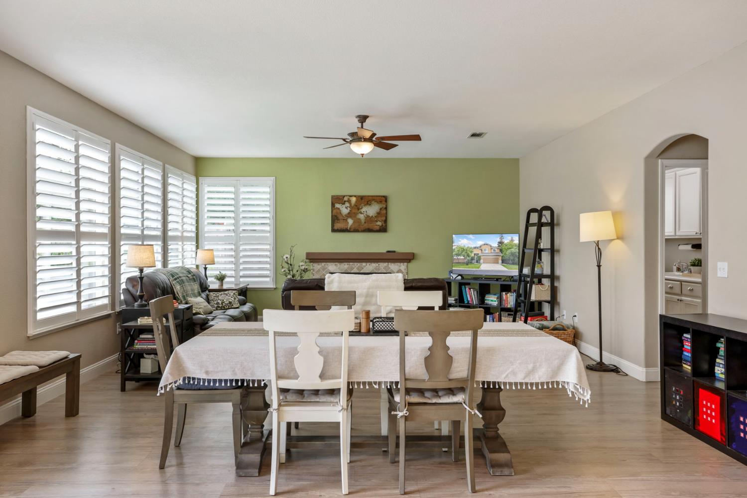 3755 Canyonlands Road Stockton, CA 95209 - Photo 10 of 37 a dining room with furniture window and wooden floor