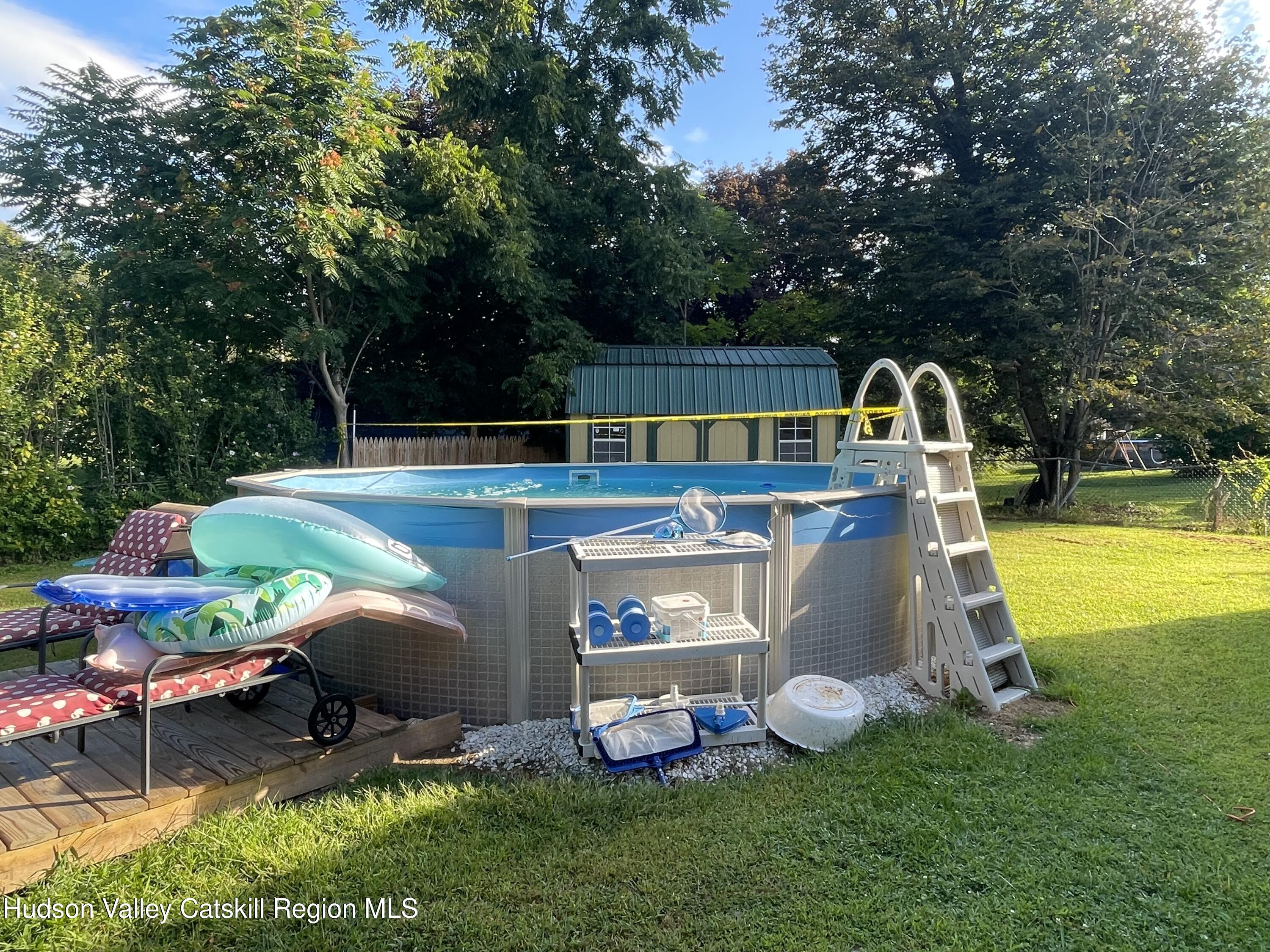 10 Johns Road Kerhonkson, NY 12446 - Photo 26 of 30 a backyard of a house with table and chairs