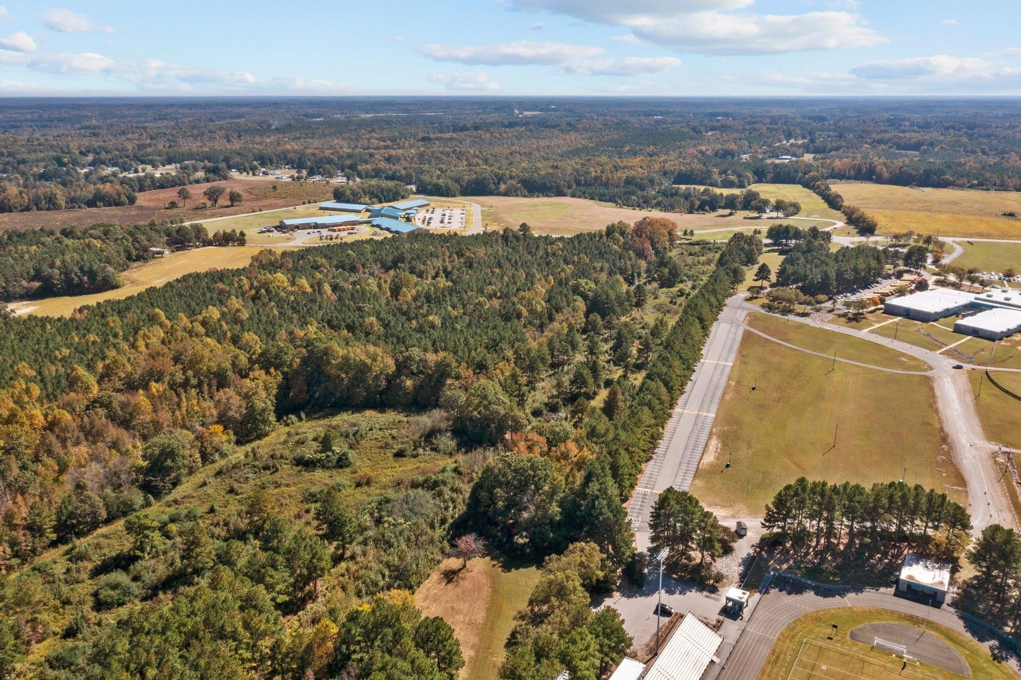 0 Garrett Road Henderson, NC 27536 - Photo 6 of 20 an aerial view of a house with a lake view