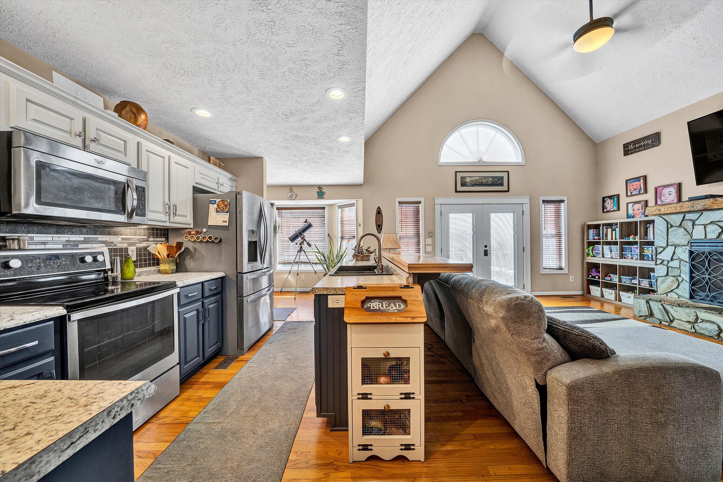 1422 Isolane Road Callaway, VA 24067 - Photo 11 of 39 a living room with stainless steel appliances furniture stove and a kitchen view