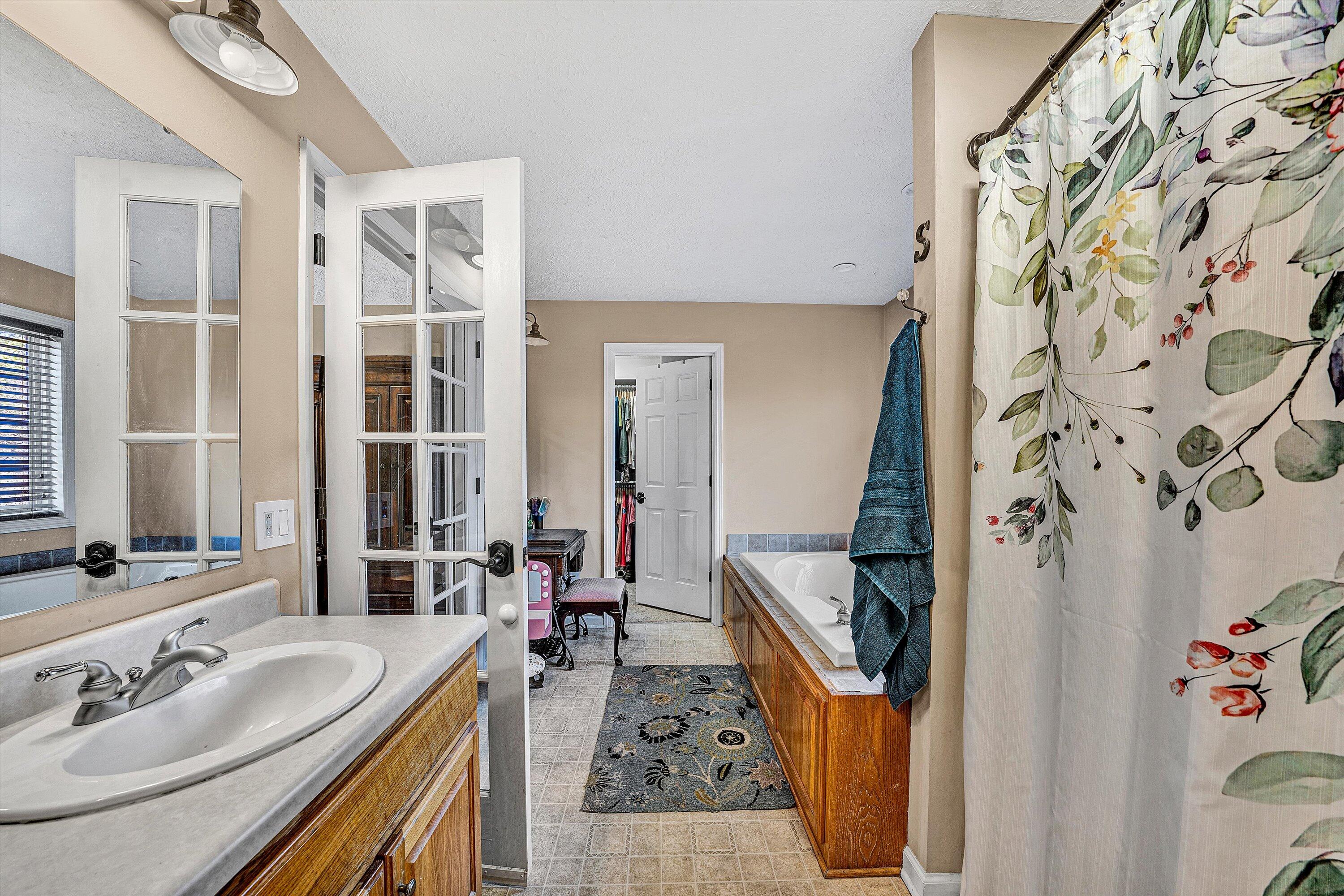 1422 Isolane Road Callaway, VA 24067 - Photo 24 of 39 a en suite bathroom with a sink and a mirror