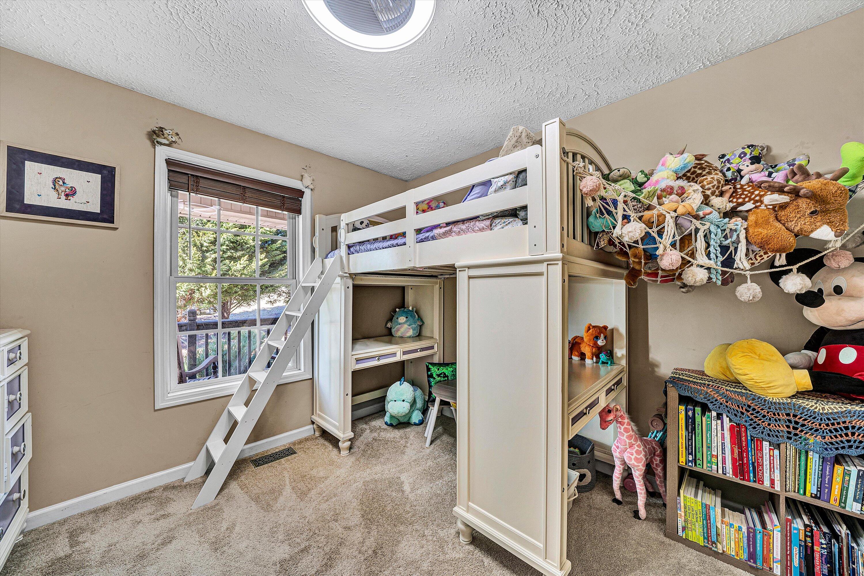 1422 Isolane Road Callaway, VA 24067 - Photo 26 of 39 a view of a workspace with furniture and a window