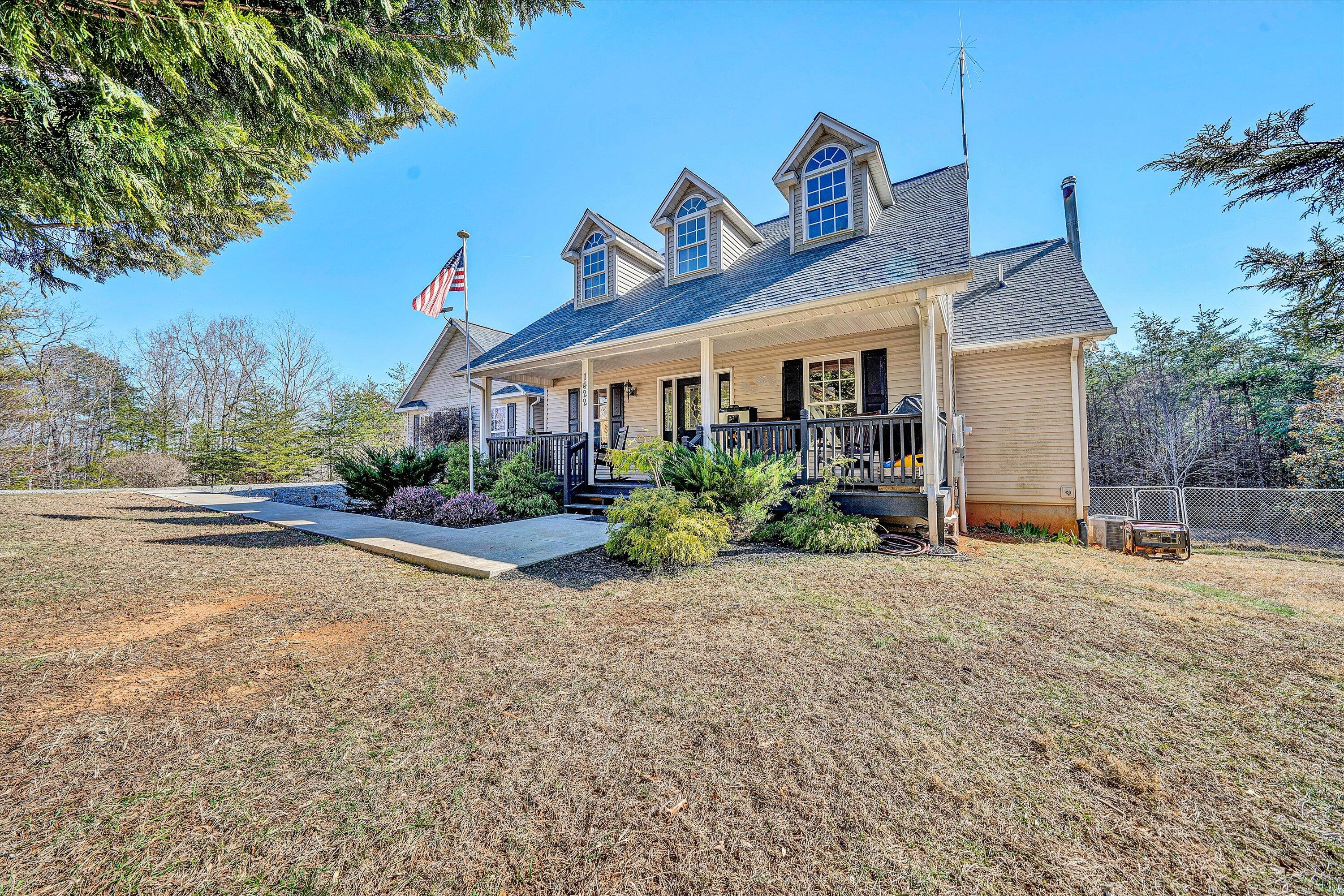 1422 Isolane Road Callaway, VA 24067 - Photo 3 of 39 a view of a house with a small yard and plants