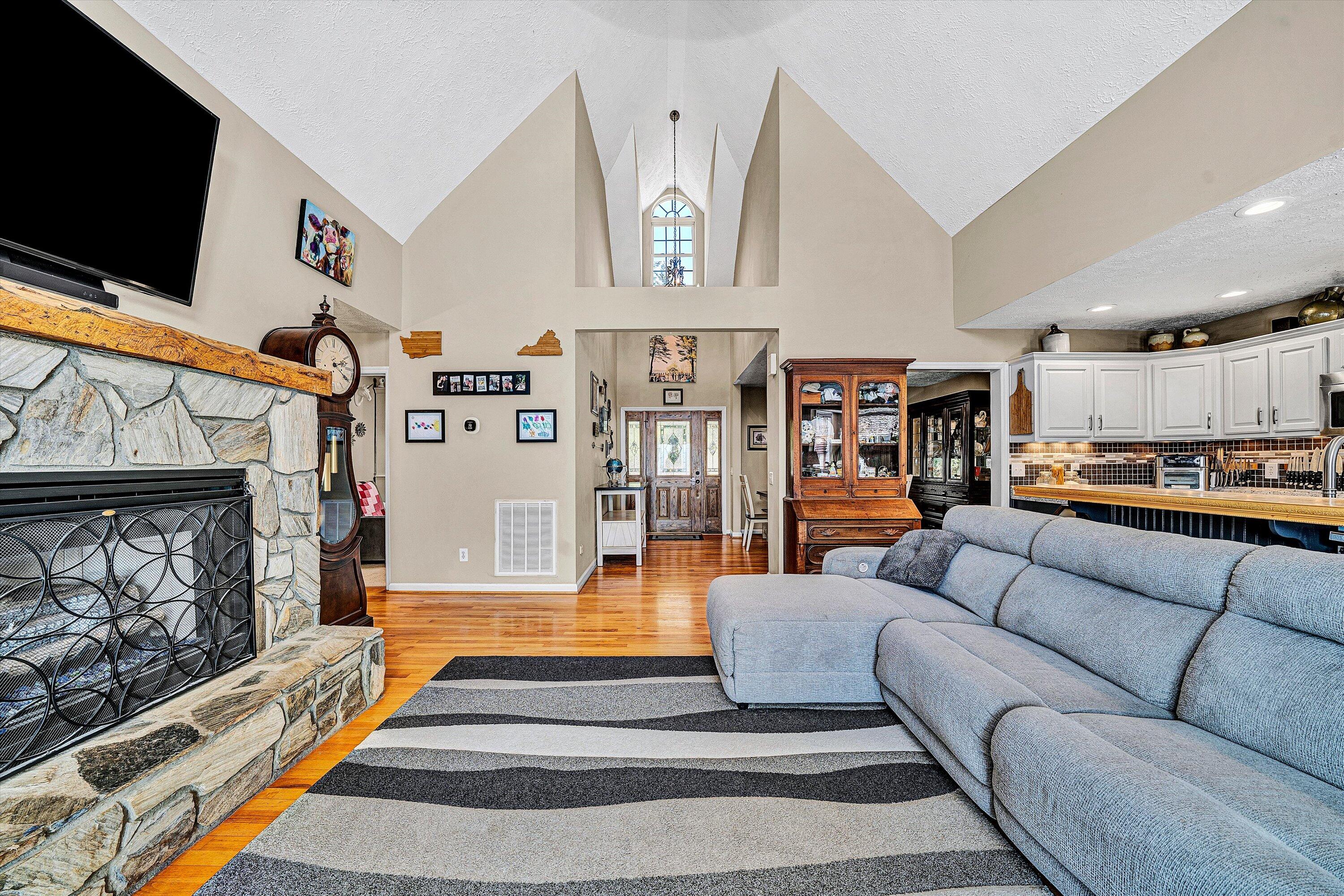 1422 Isolane Road Callaway, VA 24067 - Photo 8 of 39 a living room with furniture and a flat screen tv
