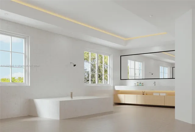 a bathroom with a bathtub and a sink