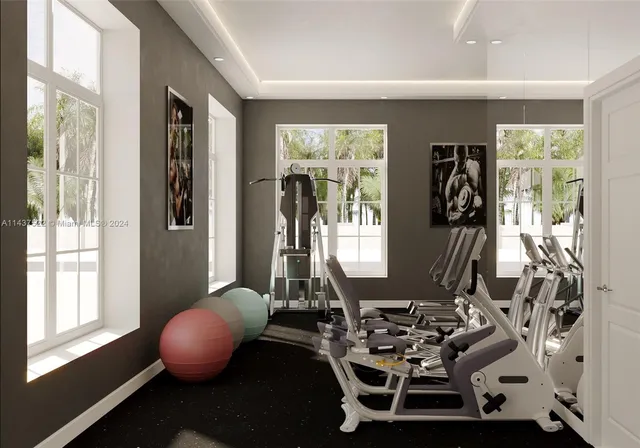 a room with furniture and large windows