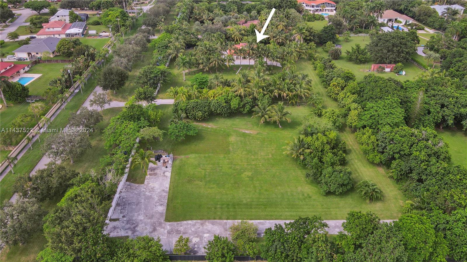 6500 Volunteer Road Southwest Ranches, FL 33330 - Photo 41 of 42 an aerial view of residential house with outdoor space and trees all around