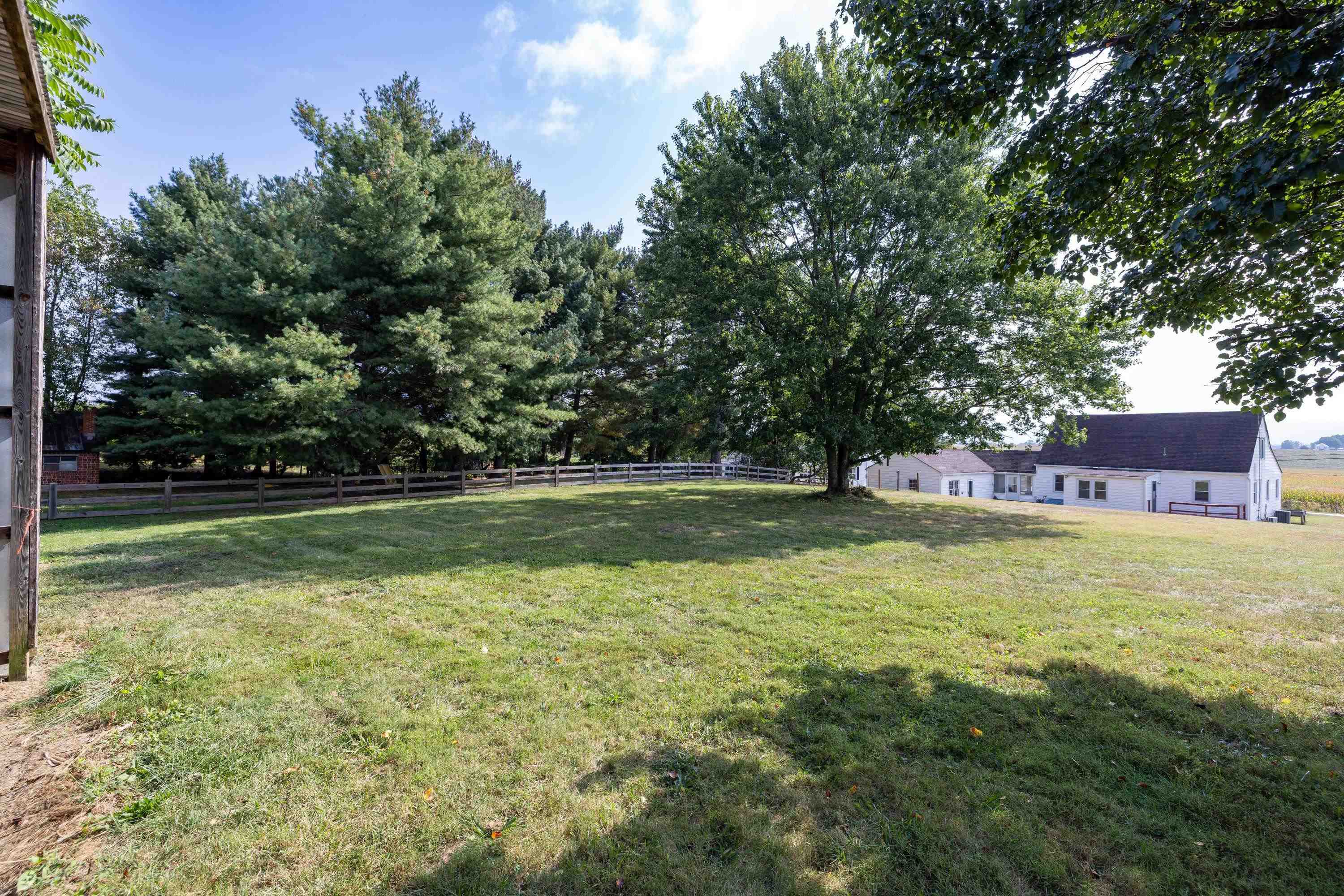 3138 Cross Keys Road Harrisonburg, VA 22801 - Photo 63 of 74 The spacious backyard area offers a shady space and open storage building.