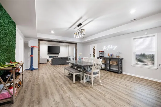 an aerial view of multiple houses with outdoor space