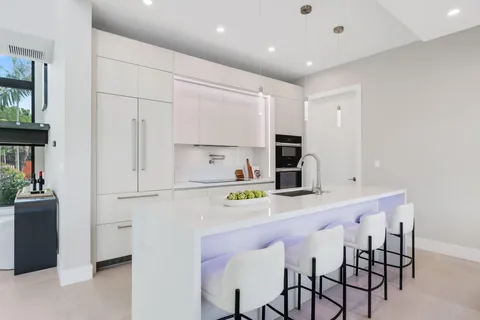 a view of a kitchen with an entryway