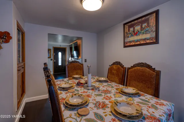 a view of a workspace with furniture and closet