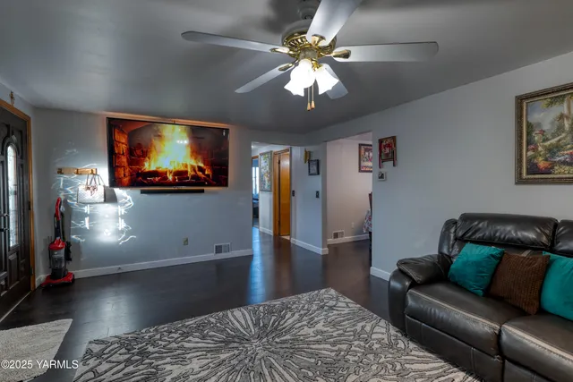 a view of a hallway with closet and a mirror
