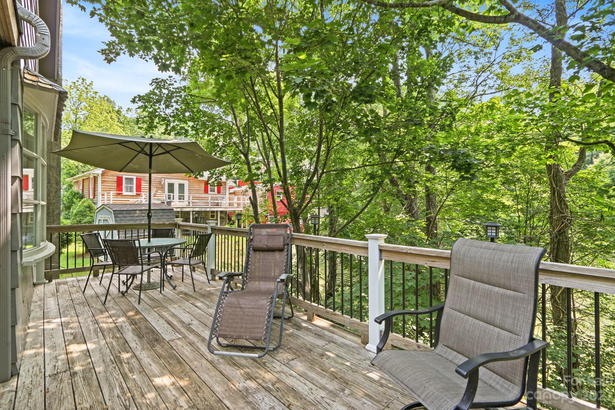 270 Pine Street Boone, NC 28607 - Photo 18 of 47 a view of a chairs and table in patio
