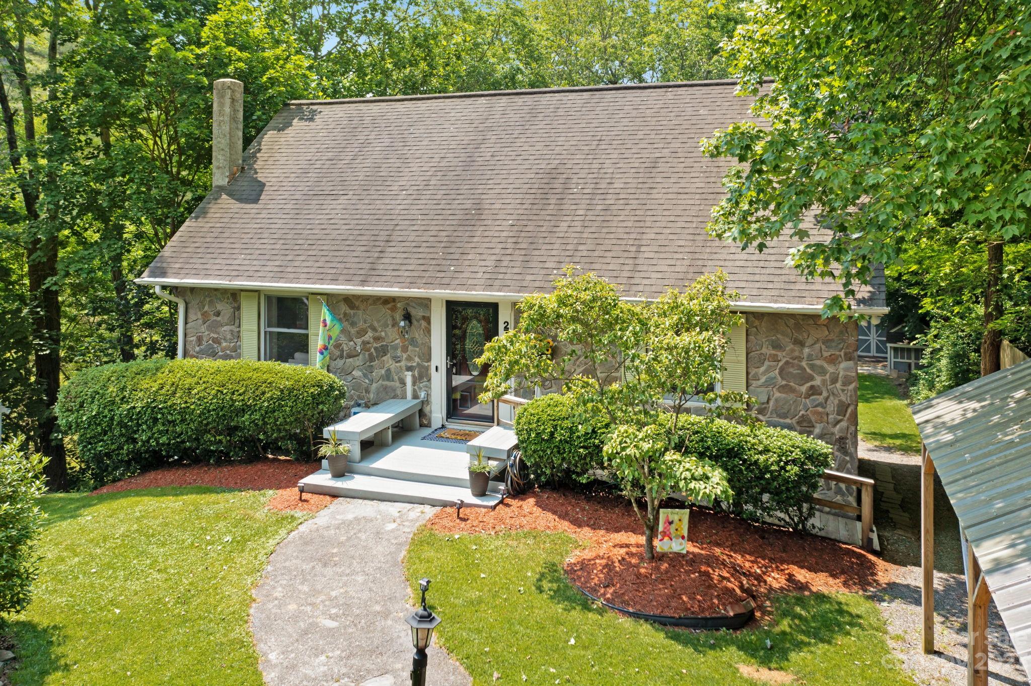 270 Pine Street Boone, NC 28607 - Photo 2 of 47 front view of a house with a yard