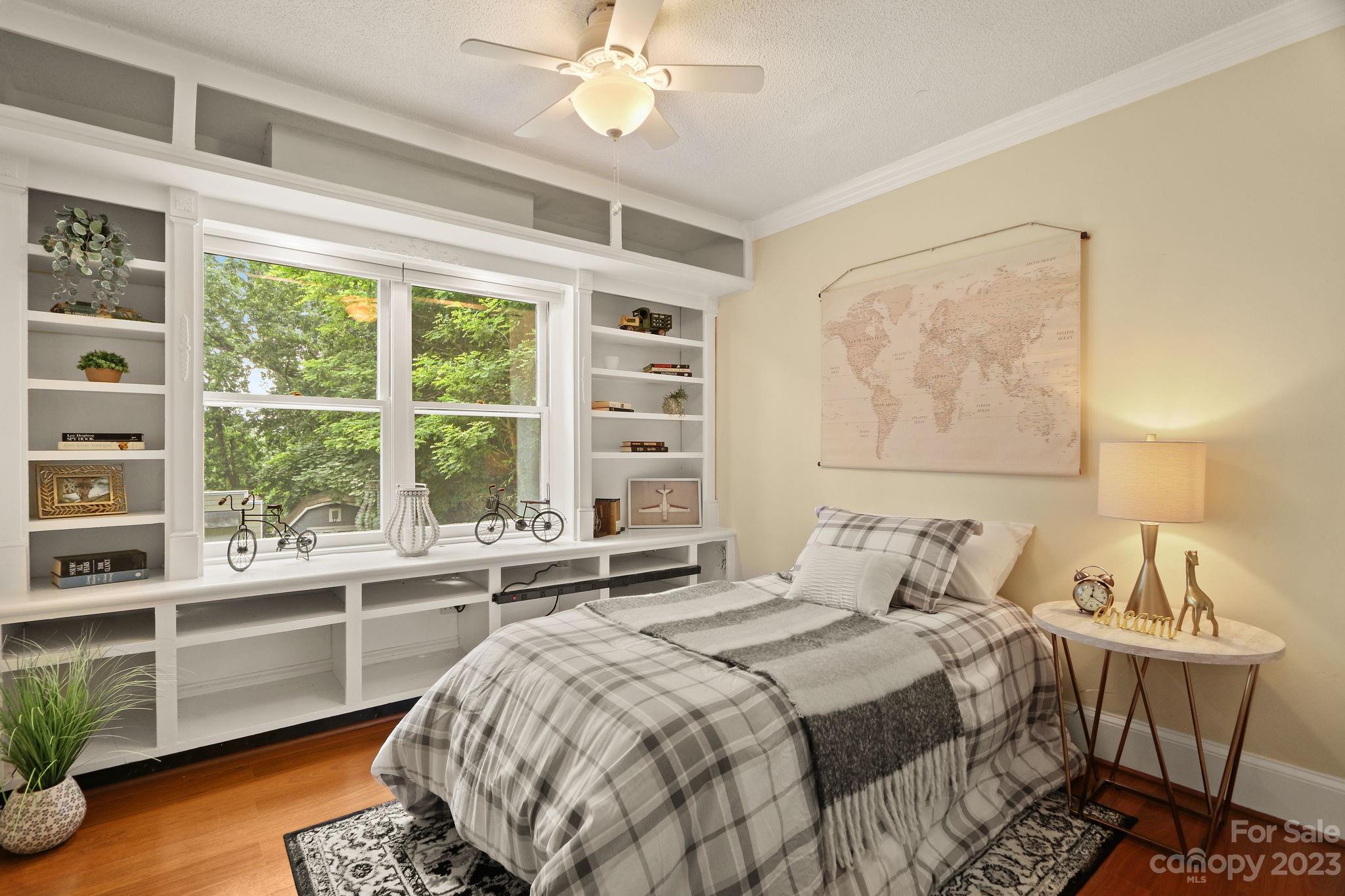 270 Pine Street Boone, NC 28607 - Photo 25 of 47 a bedroom with a bed and a large window