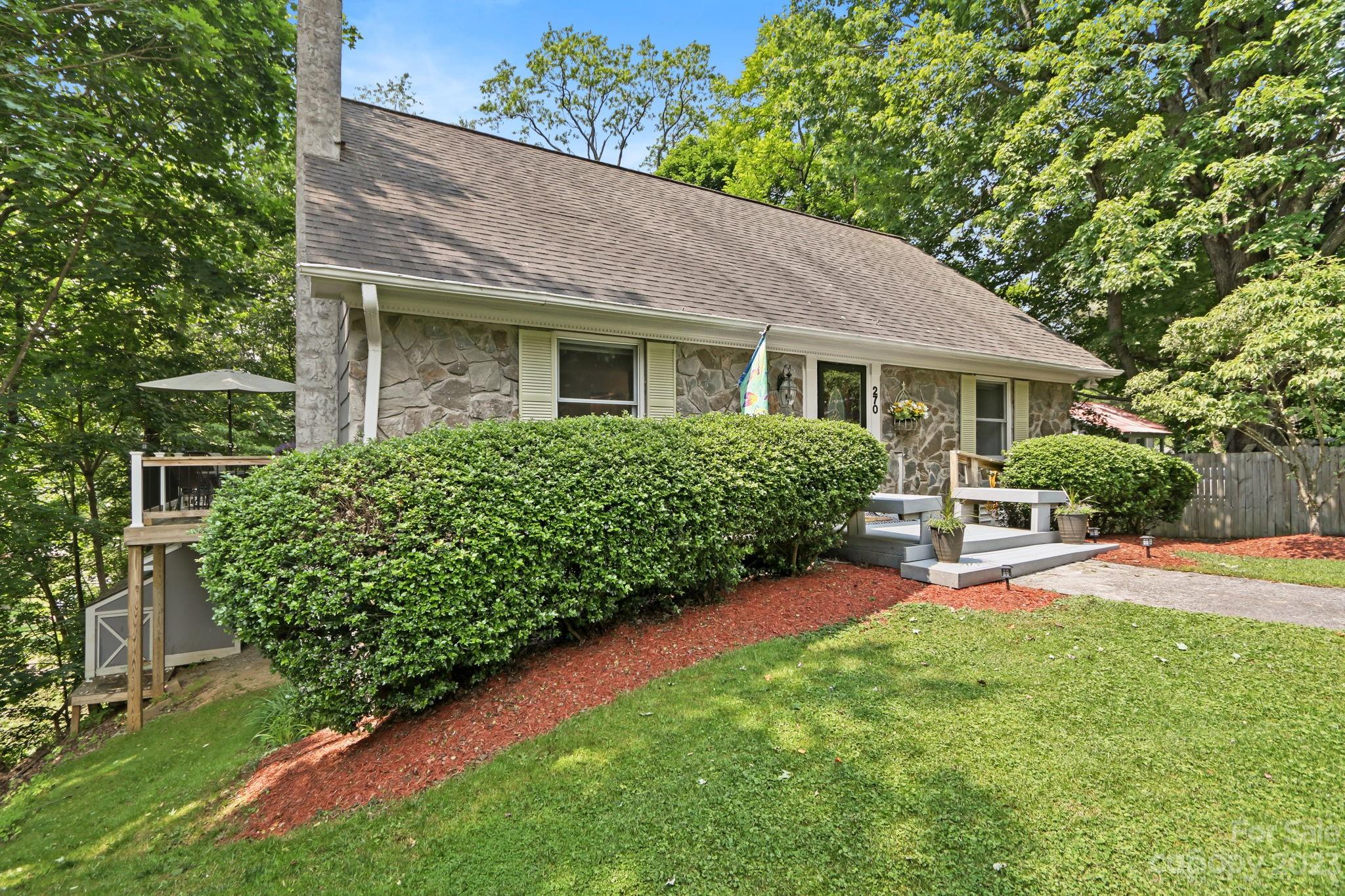 270 Pine Street Boone, NC 28607 - Photo 3 of 47 a view of a house with a yard and sitting area