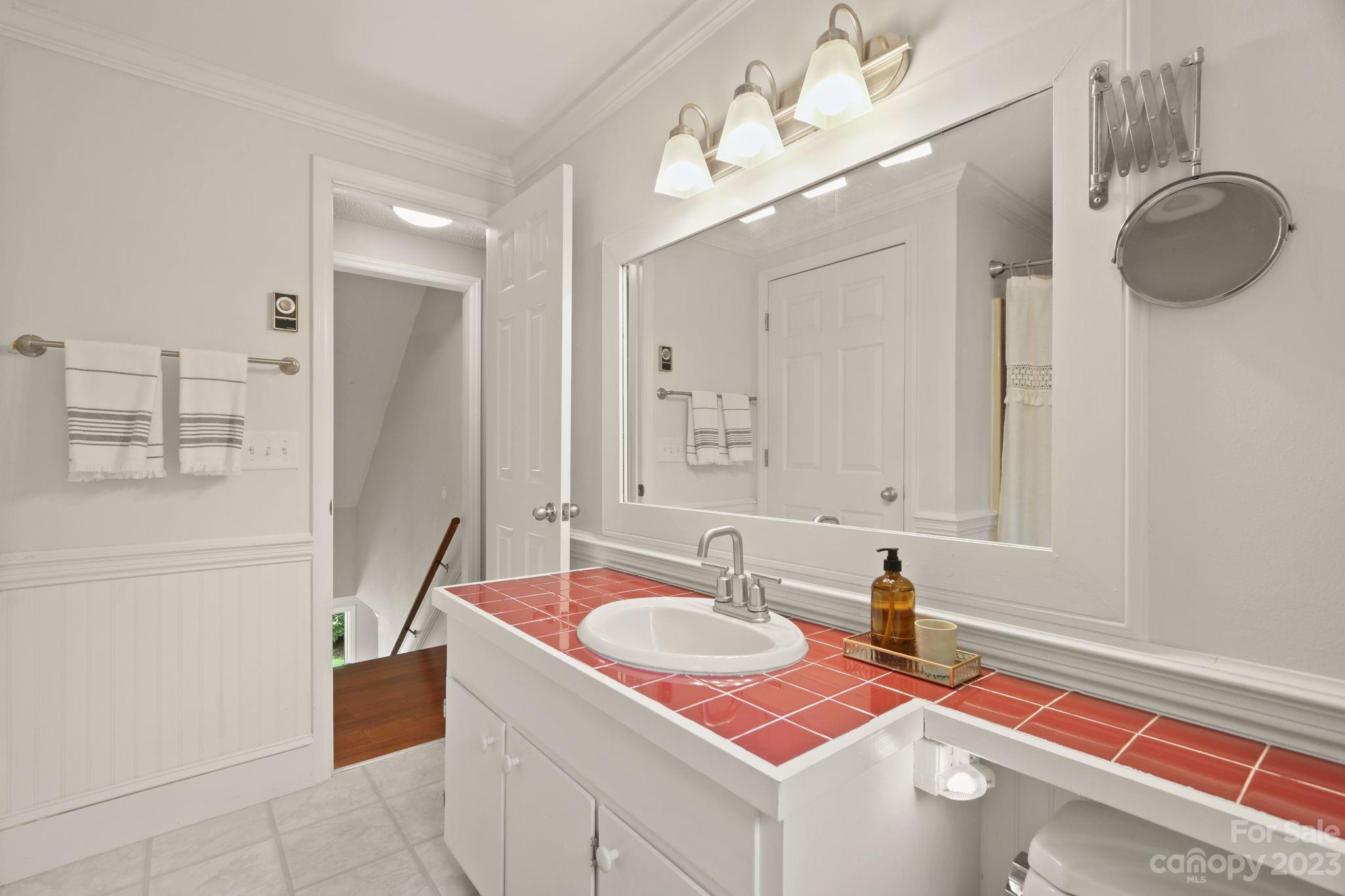 270 Pine Street Boone, NC 28607 - Photo 32 of 47 a bathroom with a sink vanity tub and shower