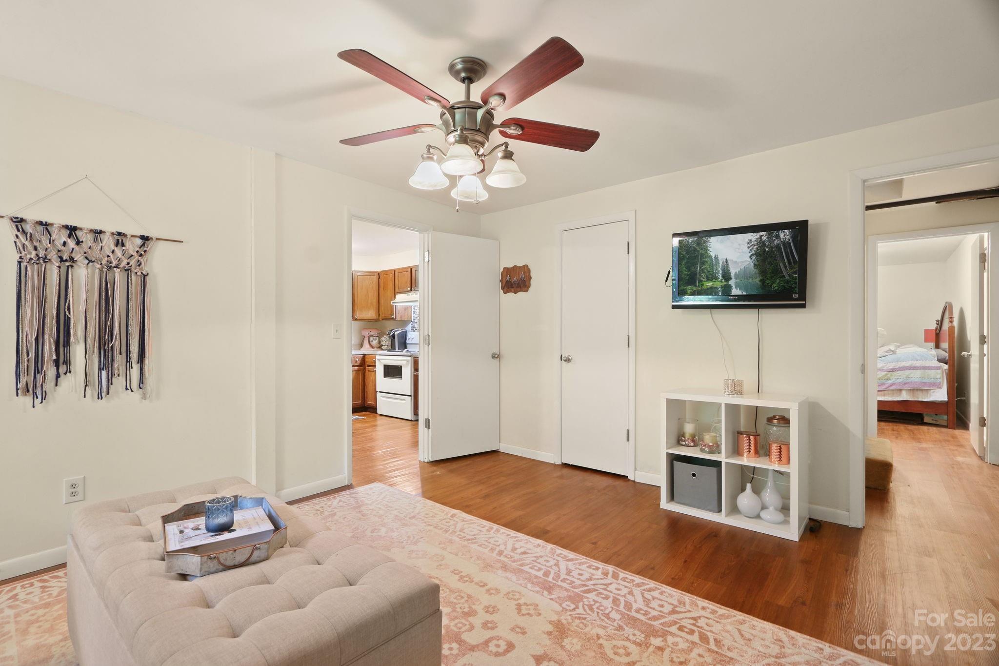 270 Pine Street Boone, NC 28607 - Photo 36 of 47 a living room with furniture and a flat screen tv