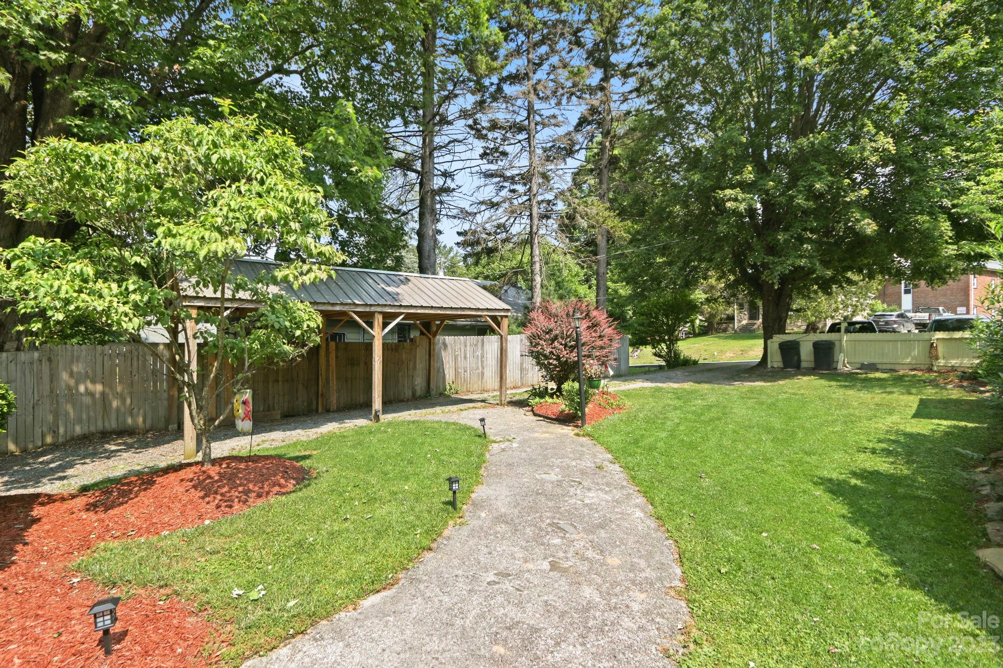270 Pine Street Boone, NC 28607 - Photo 4 of 47 a front view of a house with a yard